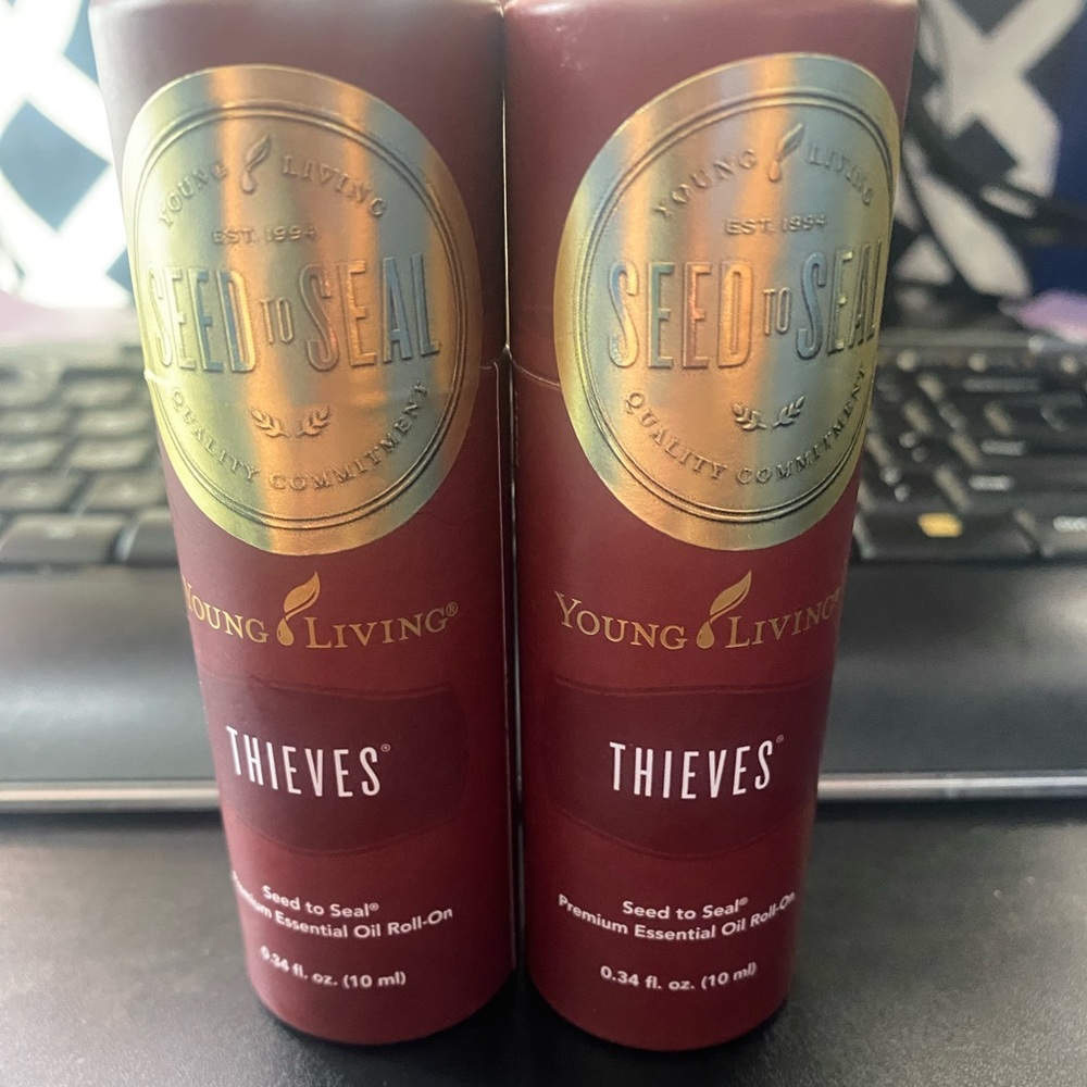 2 Thieves Blend Essential Oil Rollers. 10ml each. New & sealed. Young Living.